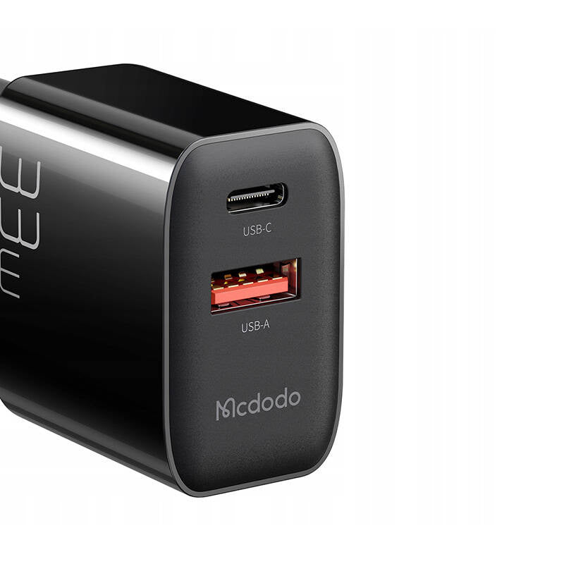 Cumpara acum Mcdodo CH-0922 Încărcător de rețea USB + USB-C, 33W + cablu USB-C (negru) de la Mesterul Minune