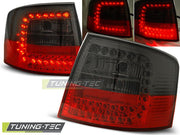 Stopuri rosu fumurii pentru Audi A6 05.1997-05.2004. Tuning-Tec - LDAU52