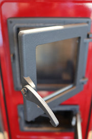 Semineu cu plita din fonta Fiama SD CORNER, pe lemne,brichete si carbune, putere 6 kW, culoare red