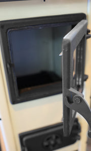 Semineu cu plita din fonta Fiama SD HERA, pe lemne,brichete si carbune, putere 6 kW, culoare crem